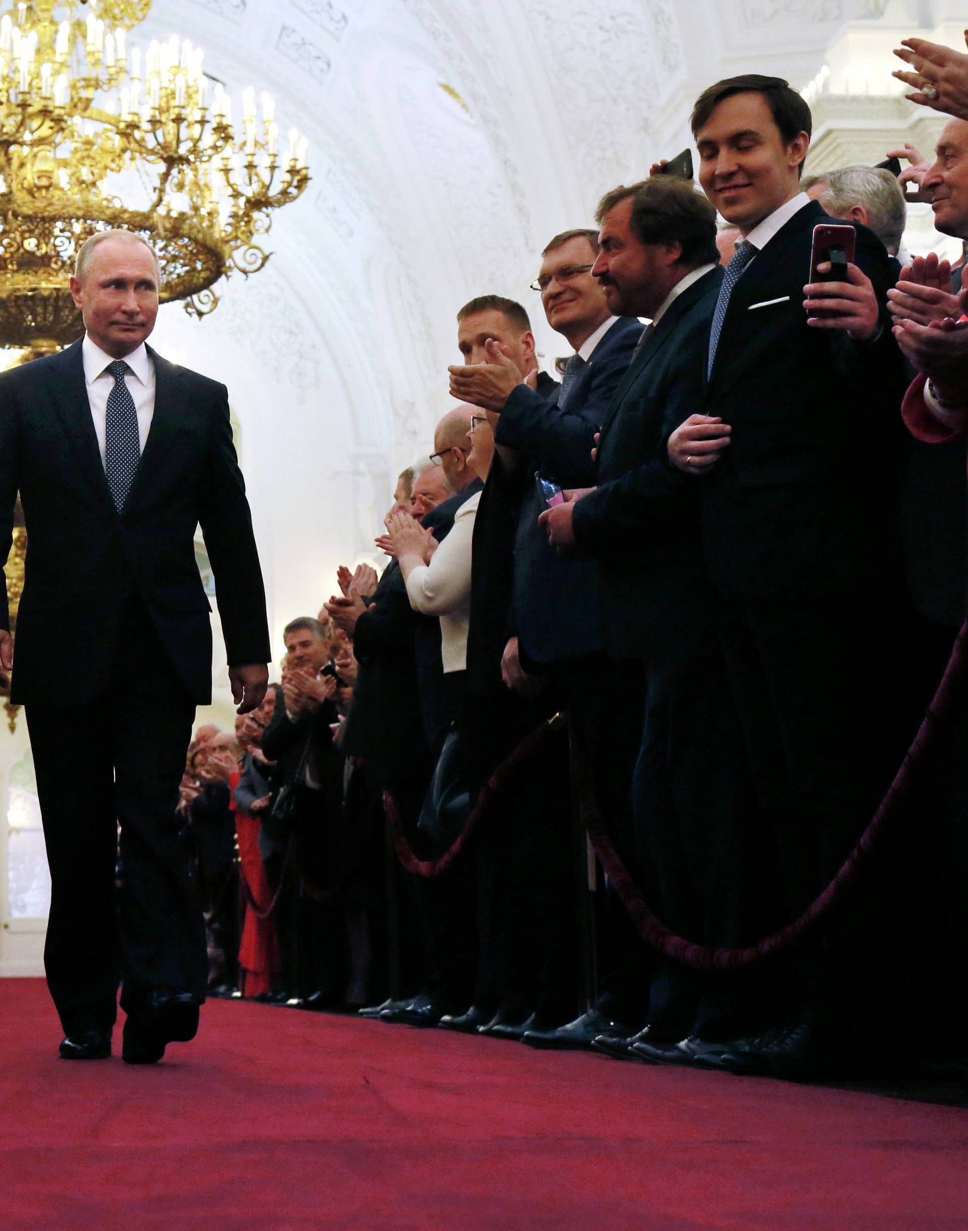 Russian President Putin walks before an inauguration ceremony at the Kremlin in Moscow