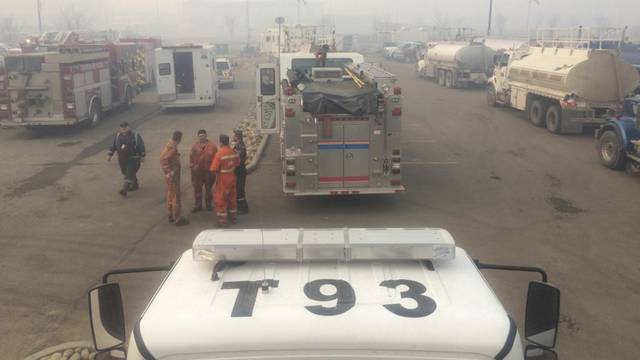 Municipal District of Bonnyville Alberta photo of Bonnyville Regional Fire Authority crews waiting for their assignments after a long night of firefighting in Fort McMurrary Alberta
