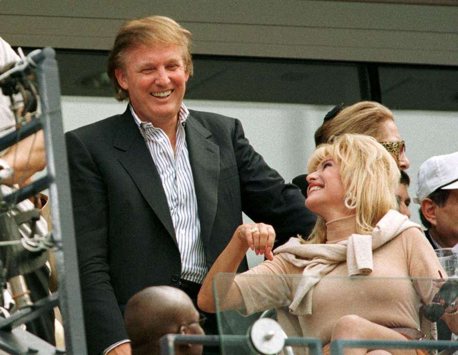 FILE PHOTO: Developer Donald Trump talks with his former wife Ivana Trump during the men's final at the U.S. Open