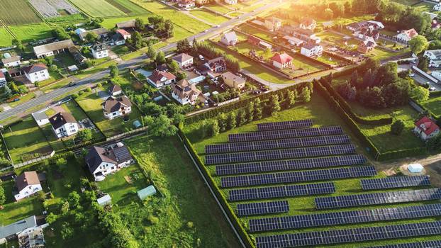 Green,Neighborhood,With,Solar-powered,Homes,Aerial,View