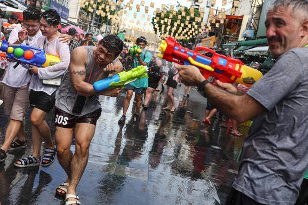 Revellers celebrate the New Year Water Festival in Bangkok