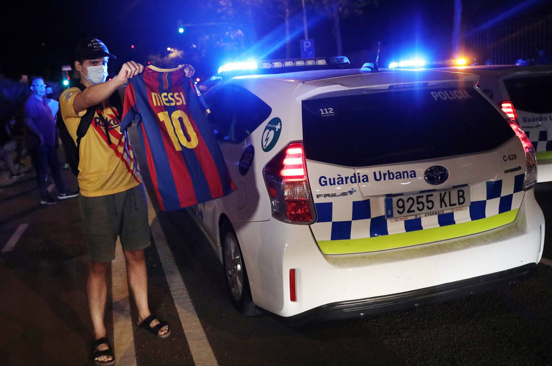 Barcelona fans are seen outside the Camp Nou after captain Lionel Messi told Barcelona he wishes to leave the club immediately