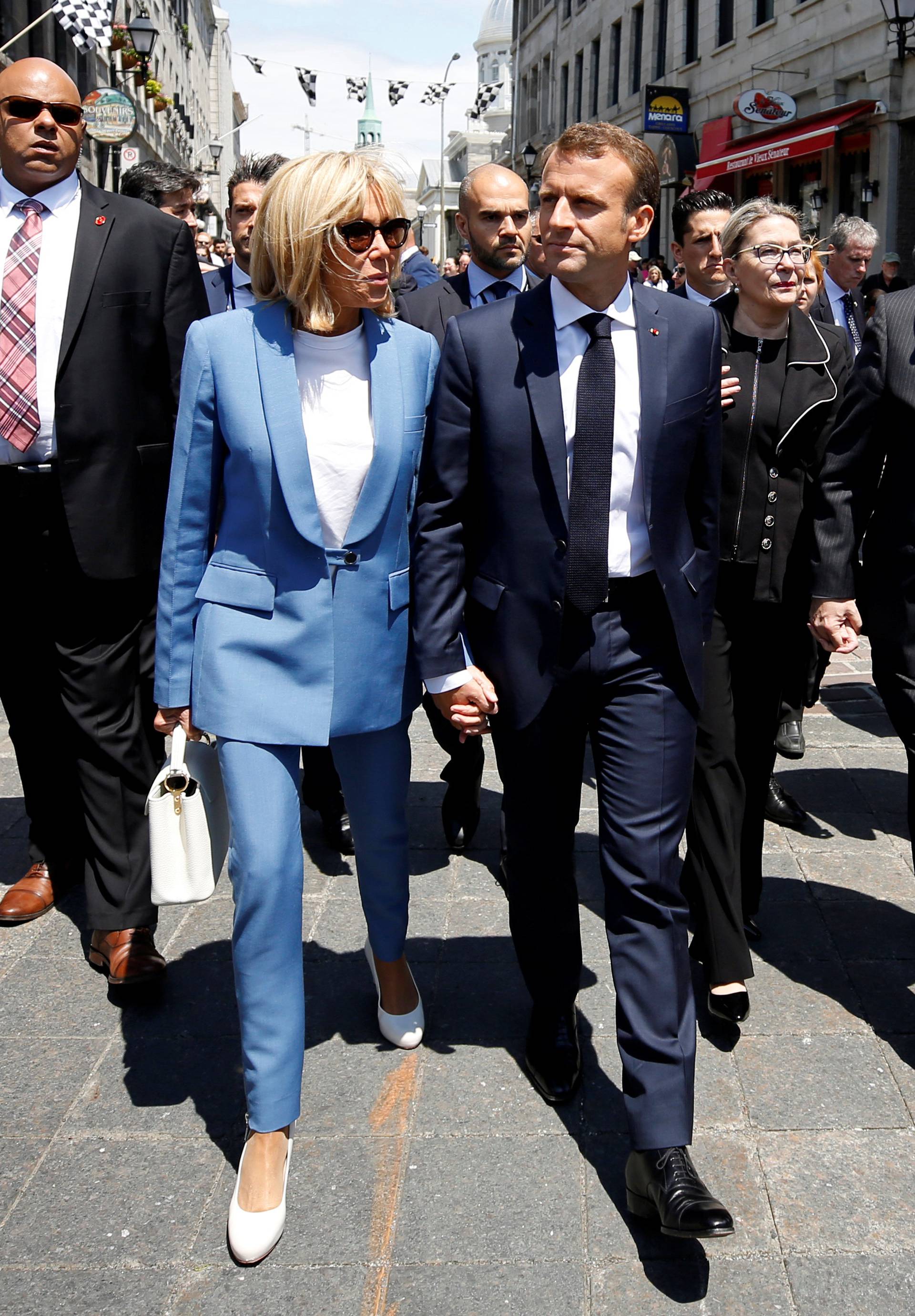 French President Emmanuel Macron and his wife Brigitte Macron tour Old Montreal in Montreal