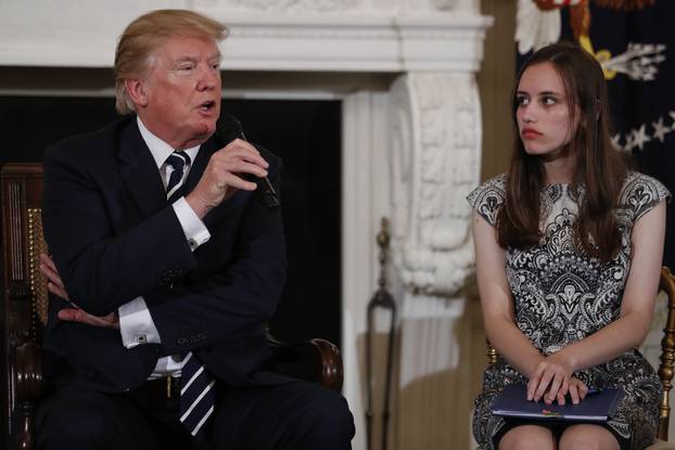 U.S. President Donald Trump hosts a listening session with high school students and teachers to discuss school safety at the White House in Washington