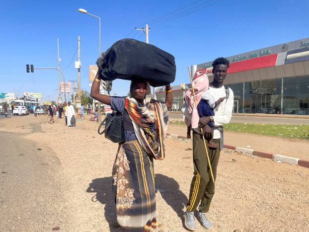 People gather at the station to flee from Khartoum