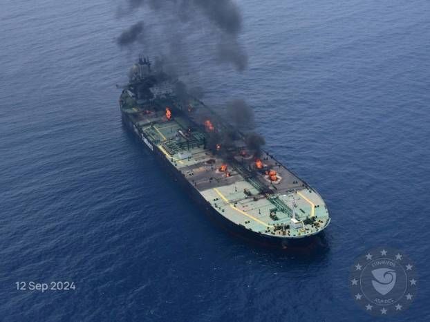 FILE PHOTO: Flames and smoke rise from the Greek-flagged oil tanker Sounion