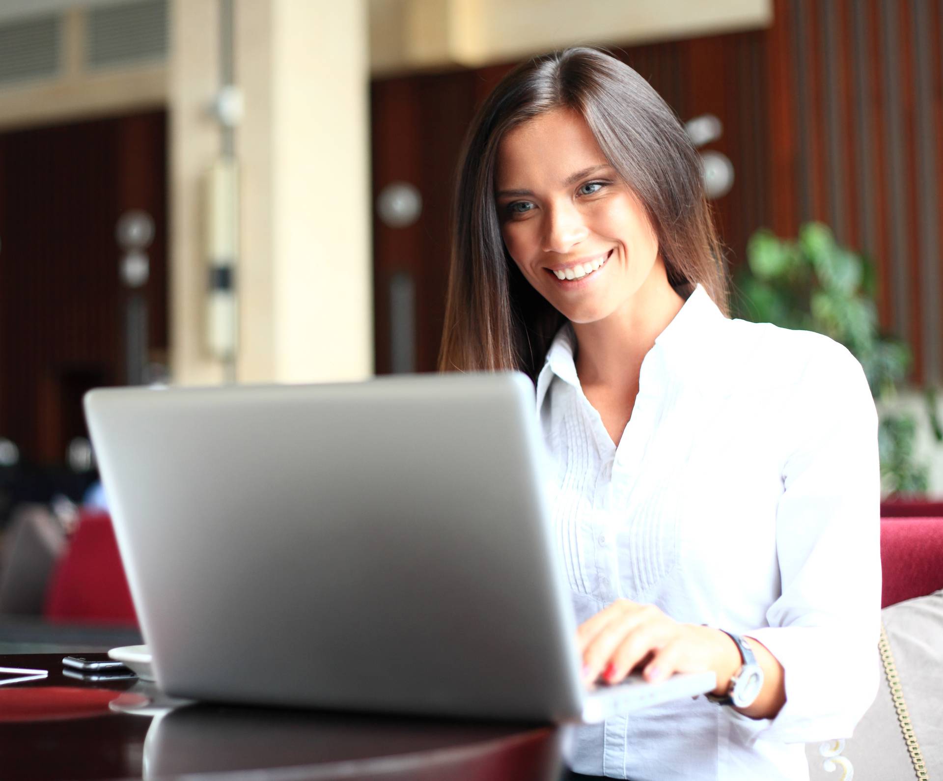 Shot of an attractive mature businesswoman working on laptop in her workstation.
