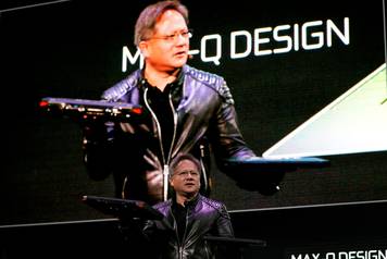 Jensen Huang, CEO of Nvidia, shows the old and new Max-Q laptops at his keynote address at CES in Las Vegas