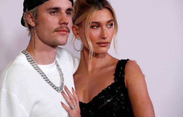 Singer Bieber and his wife Hailey Baldwin pose at the premiere for the documentary television series "Justin Bieber: Seasons" in Los Angeles