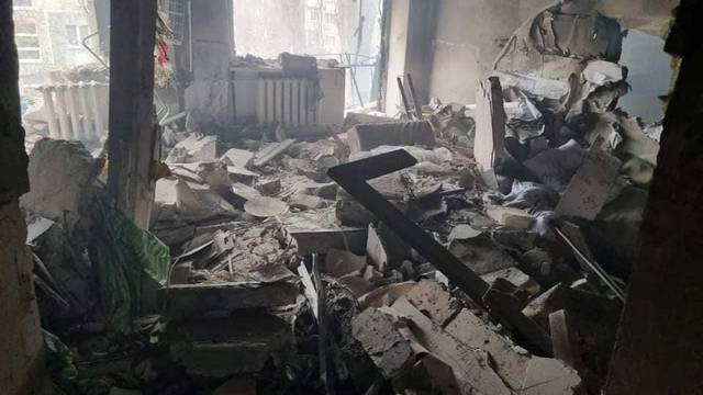 An interior view shows a residential building damaged by shelling in Mykolaiv