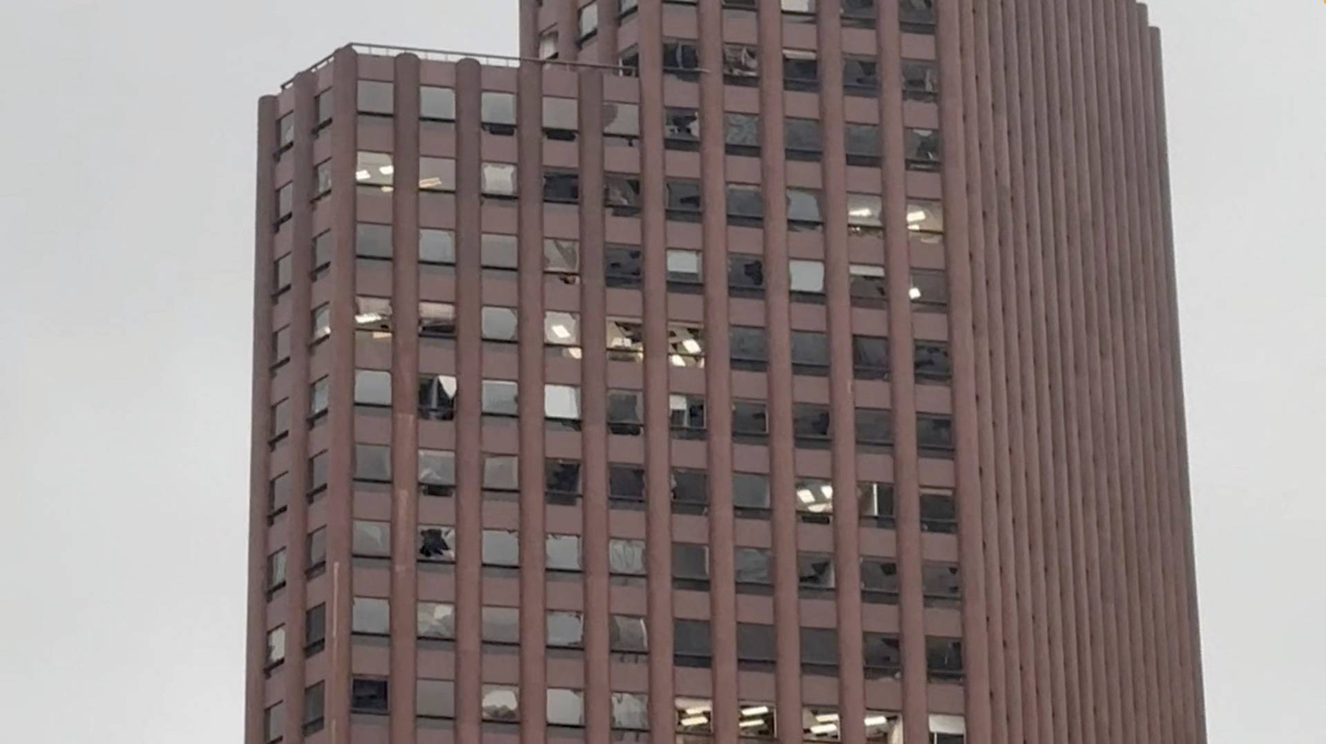 Damaged windows of a building following a storm in Houston, Texas