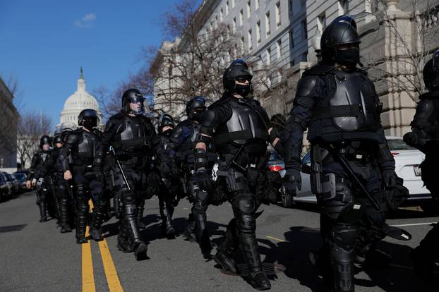 Capitol police officers patrol near the U.S. Capitol building ahead of U.S. President-elect Joe Biden