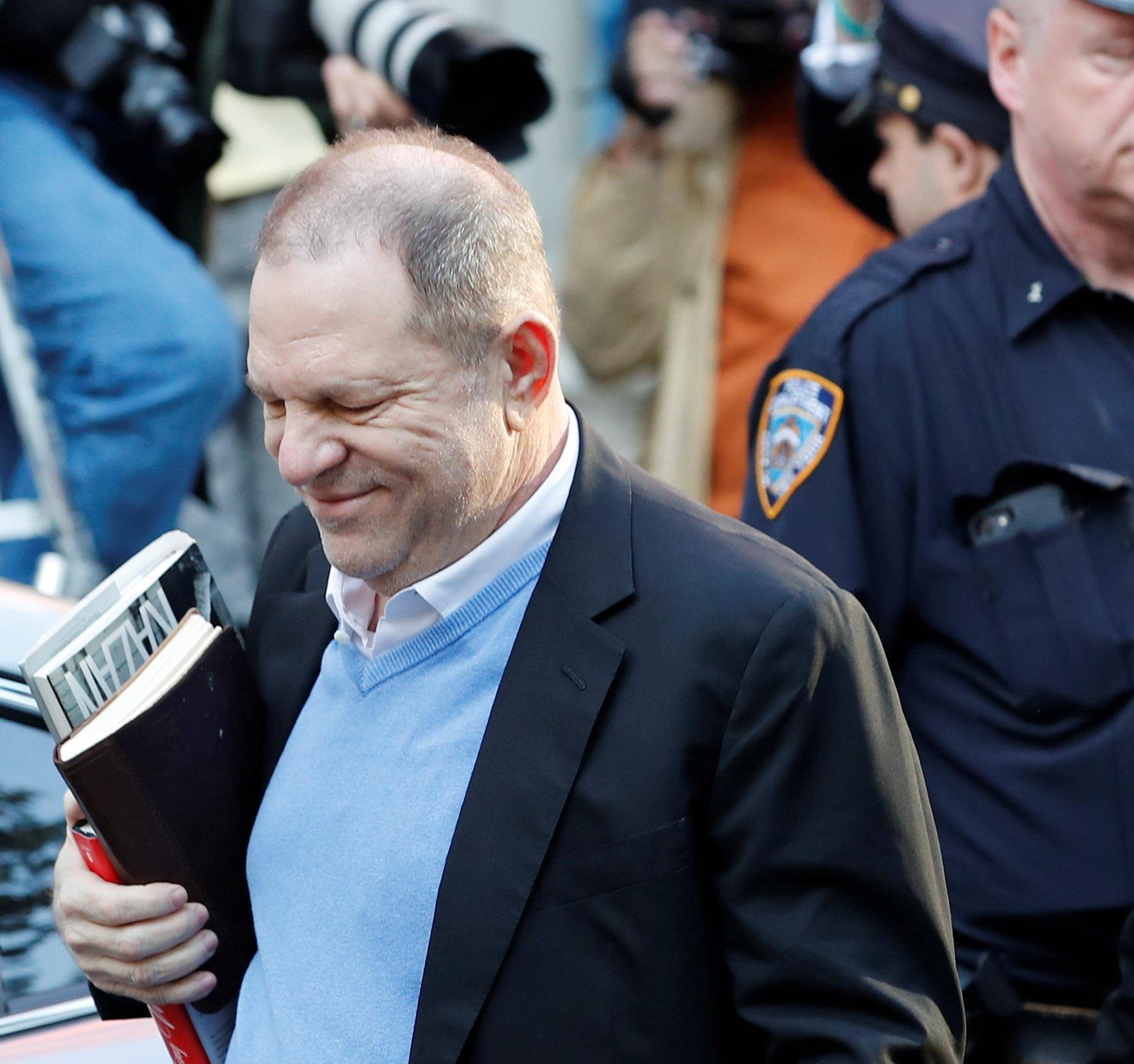 Film producer Harvey Weinstein arrives at the 1st Precinct in Manhattan in New York