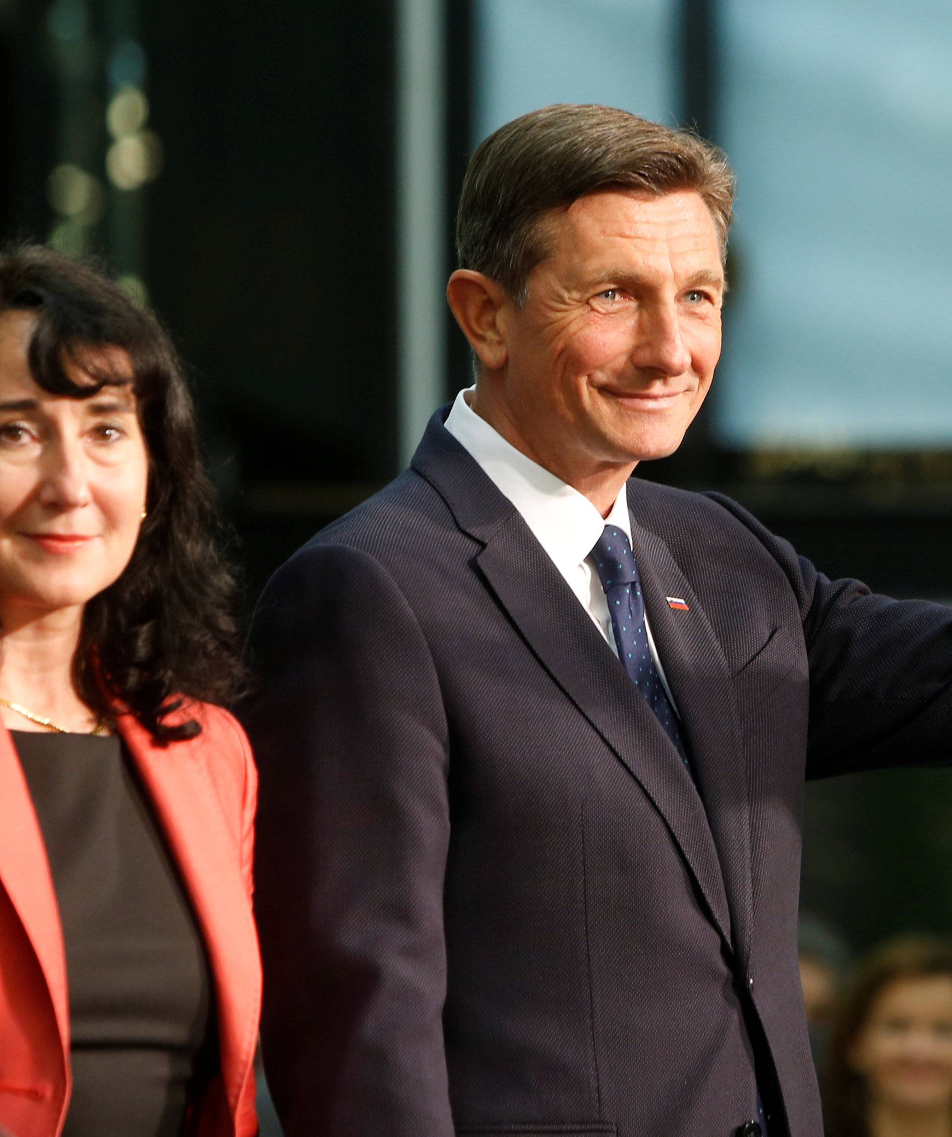 Current President and presidential candidate Borut Pahor and his wife Tanja Pecar react after first results of the second round of the presidential elections in Ljubljana