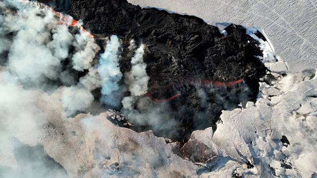 Italy's Mount Etna erupts