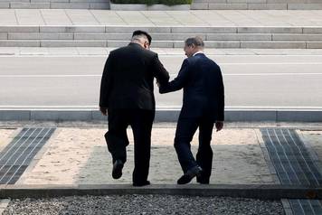 South Korean President Moon Jae-in and North Korean leader Kim Jong Un meet in the truce village of Panmunjom