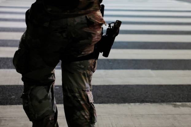 Members of the Ohio National Guard wear their sidearms while patrolling in Washington
