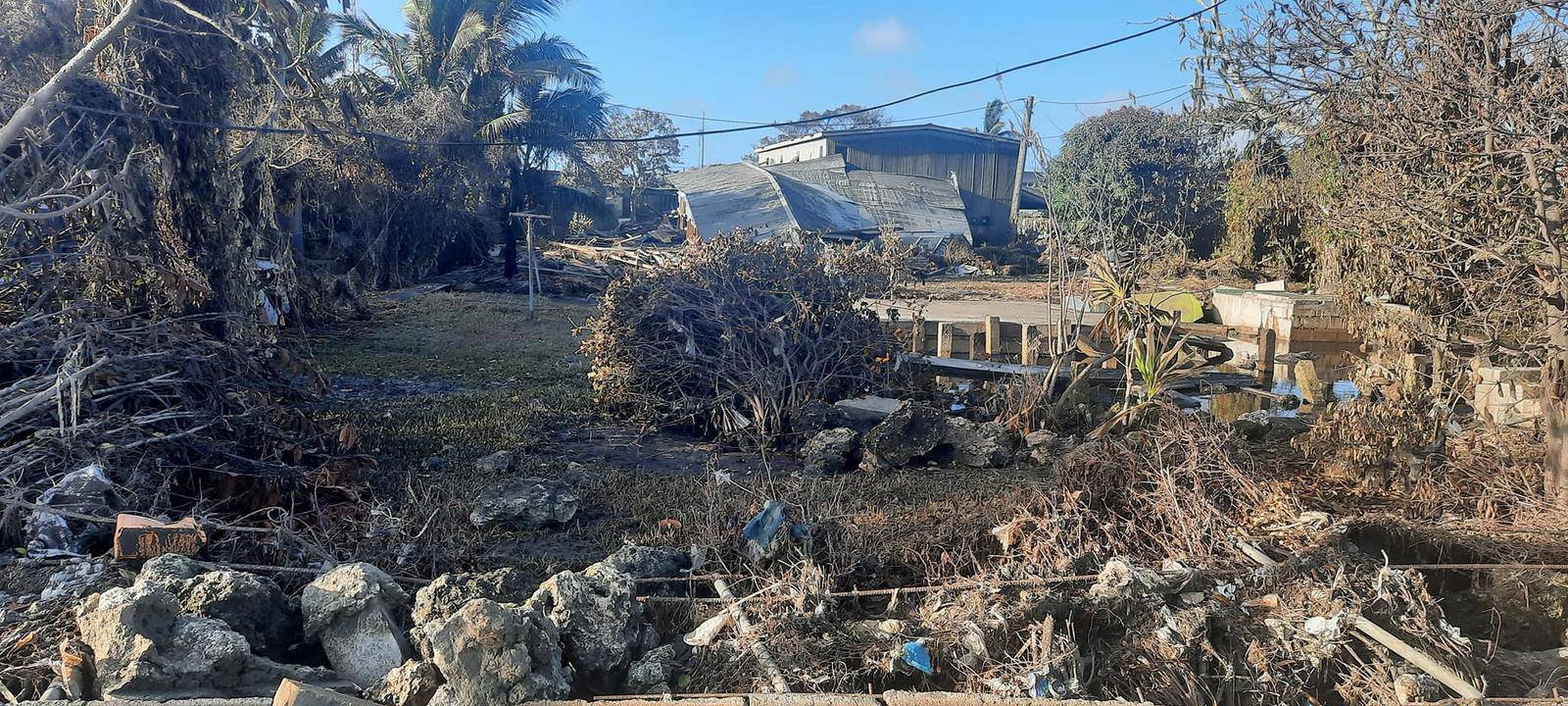 Damaged buildings following volcanic eruption and tsunami, in Nuku'alofa