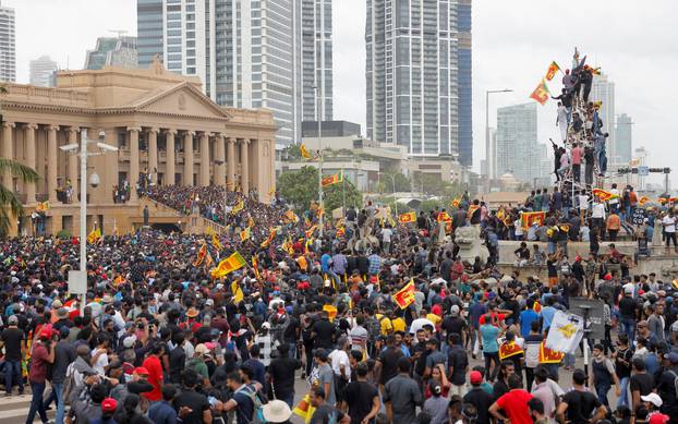 Demonstrators protest at the Presidential Secretariat, after President Gotabaya Rajapaksa fled, in Colombo