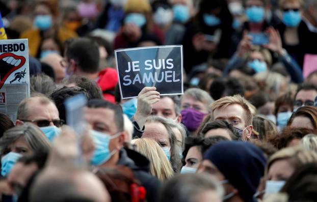 FILE PHOTO: People pay tribute to beheaded teacher Samuel Paty in Paris