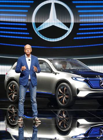 Dieter Zetsche, CEO of Daimler and Head of Mercedes-Benz, attends a news conference in front of a Mercedes EQ Electric car on media day at the Mondial de l'Automobile in Paris