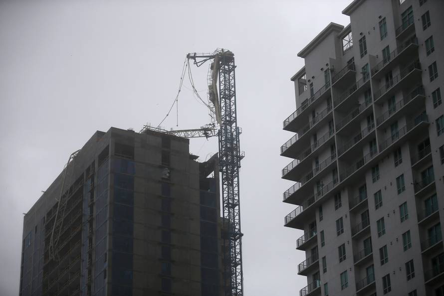 A collapsed construction crane is seen in Downtown Miami as Hurricane Irma arrives at south Florida