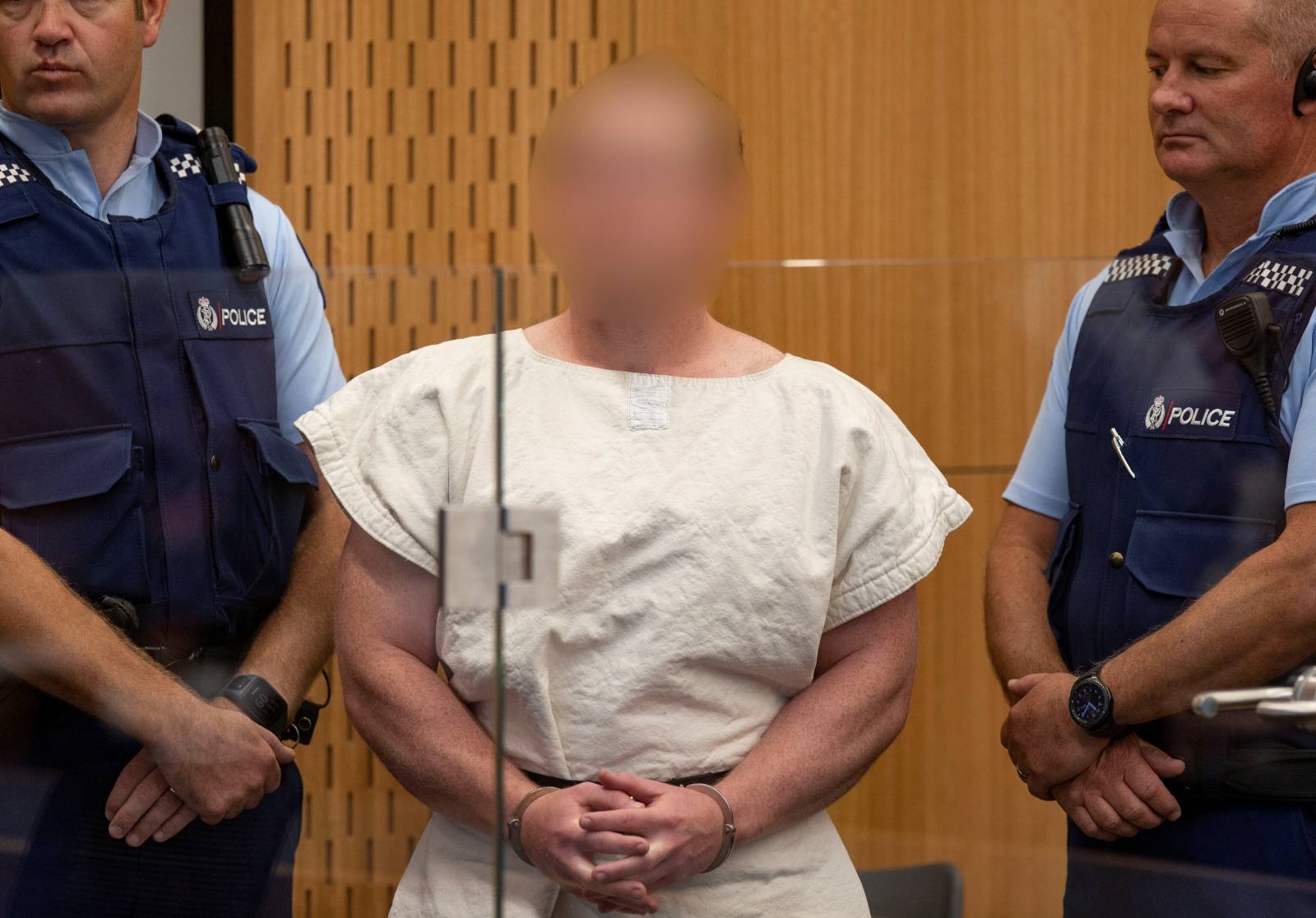 Brenton Tarrant, charged for murder in relation to the mosque attacks, is seen in the dock during his appearance in the Christchurch District Court