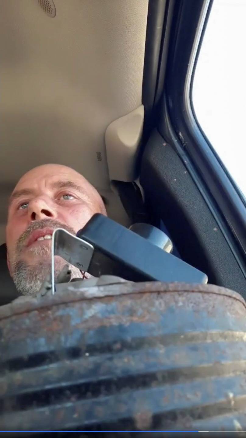 A man who claims to be sitting in his truck with explosives speaks during a Facebook livestream