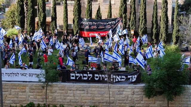 Members of the 'Brothers in Arms' reservist protest group stage a demonstration demanding equality in Israel's military service, in Jerusalem