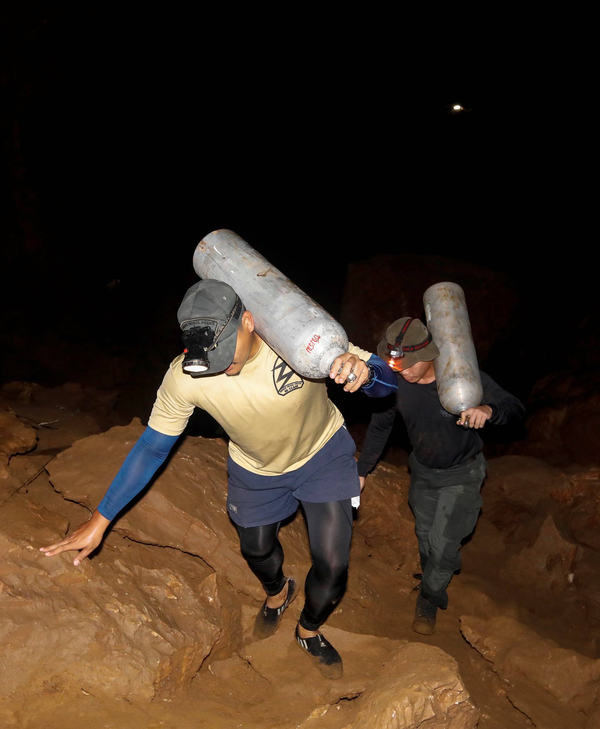 Rescue workers are seen inside of the Tham Luang caves where 13 members of an under 16 soccer team were trapped in the northern province of Chiang Rai