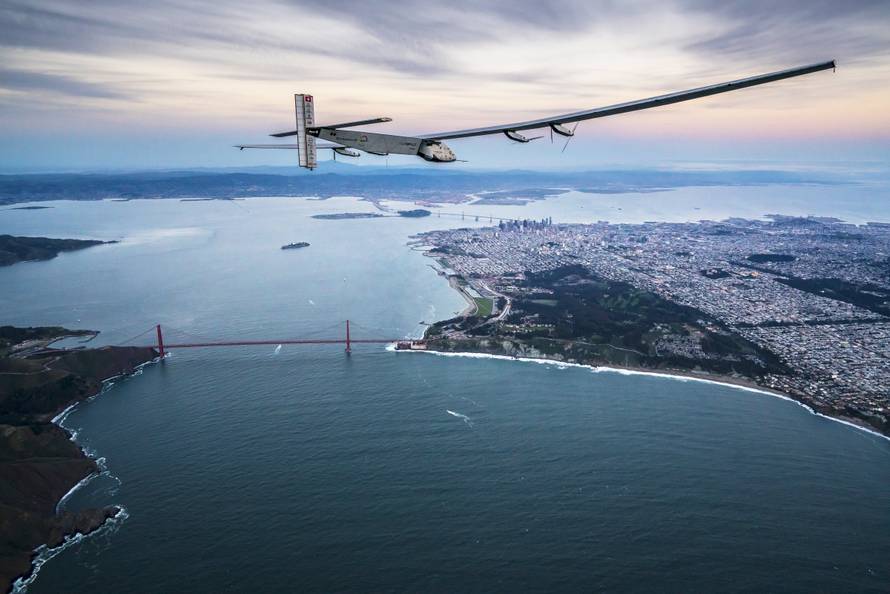 "Solar Impulse 2", a solar-powered plane piloted by Bertrand Piccard of Switzerland, flies over the Golden Gate bridge in San Francisco