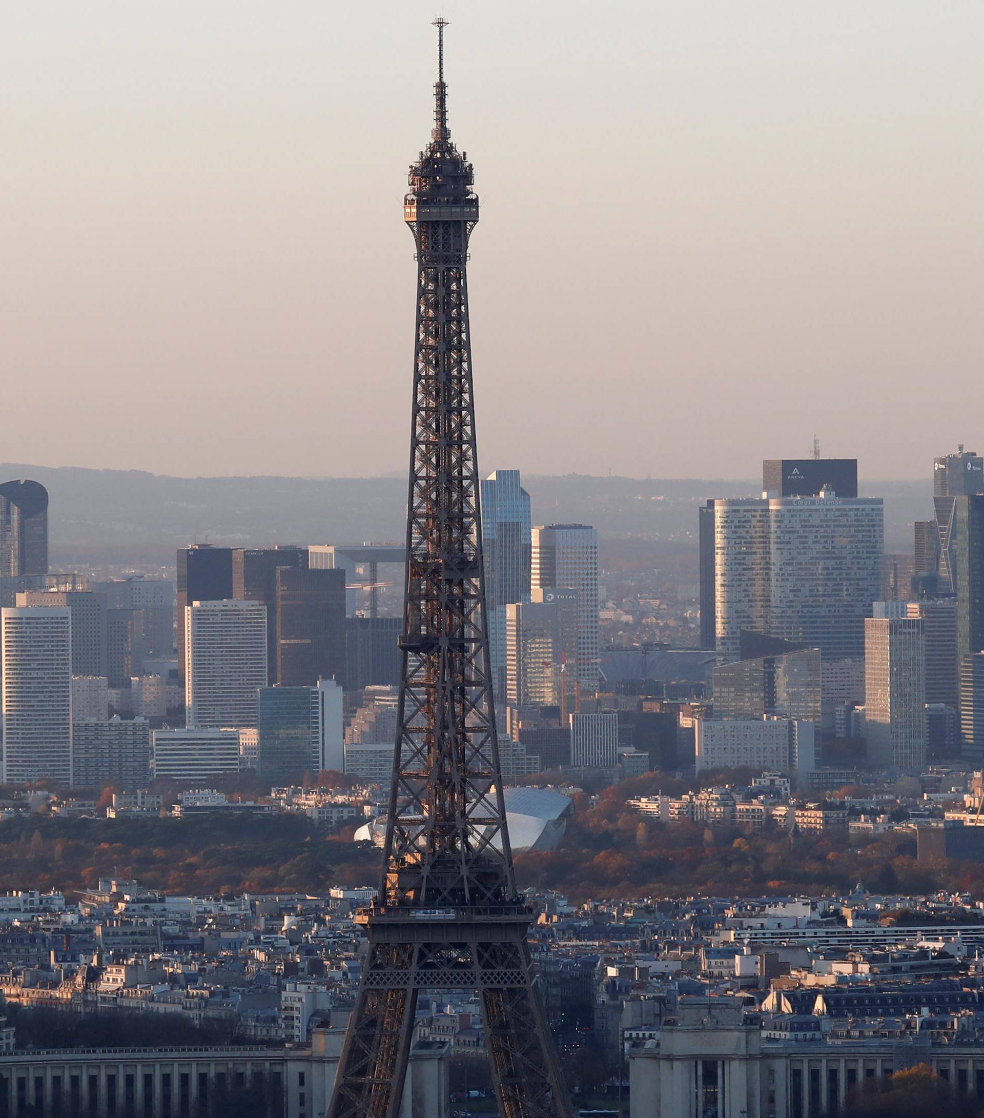 FILE PHOTO - A general view shows the Eiffel Tower and the financial and business district in La Defense, west of Paris