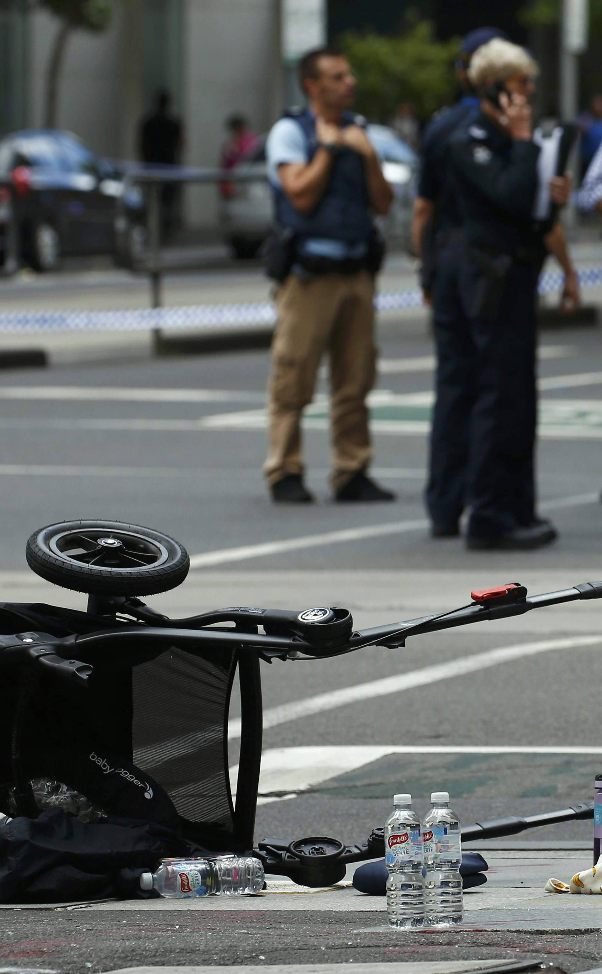 A pram is seen as police cordon off Bourke Street mall, after a car hit pedestrians in central Melbourne