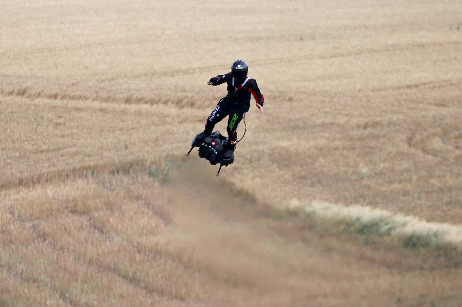 French inventor Franky Zapata flies on a Flyboard during a demonstration as he prepares to cross the English channel from Sangatte in France to Dover, at the Saint-Inglevert aerodrome