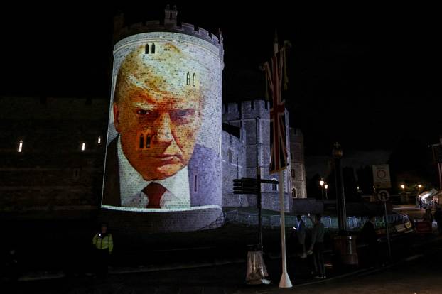 U.S. President Trump's mugshot is projected on Windsor castle