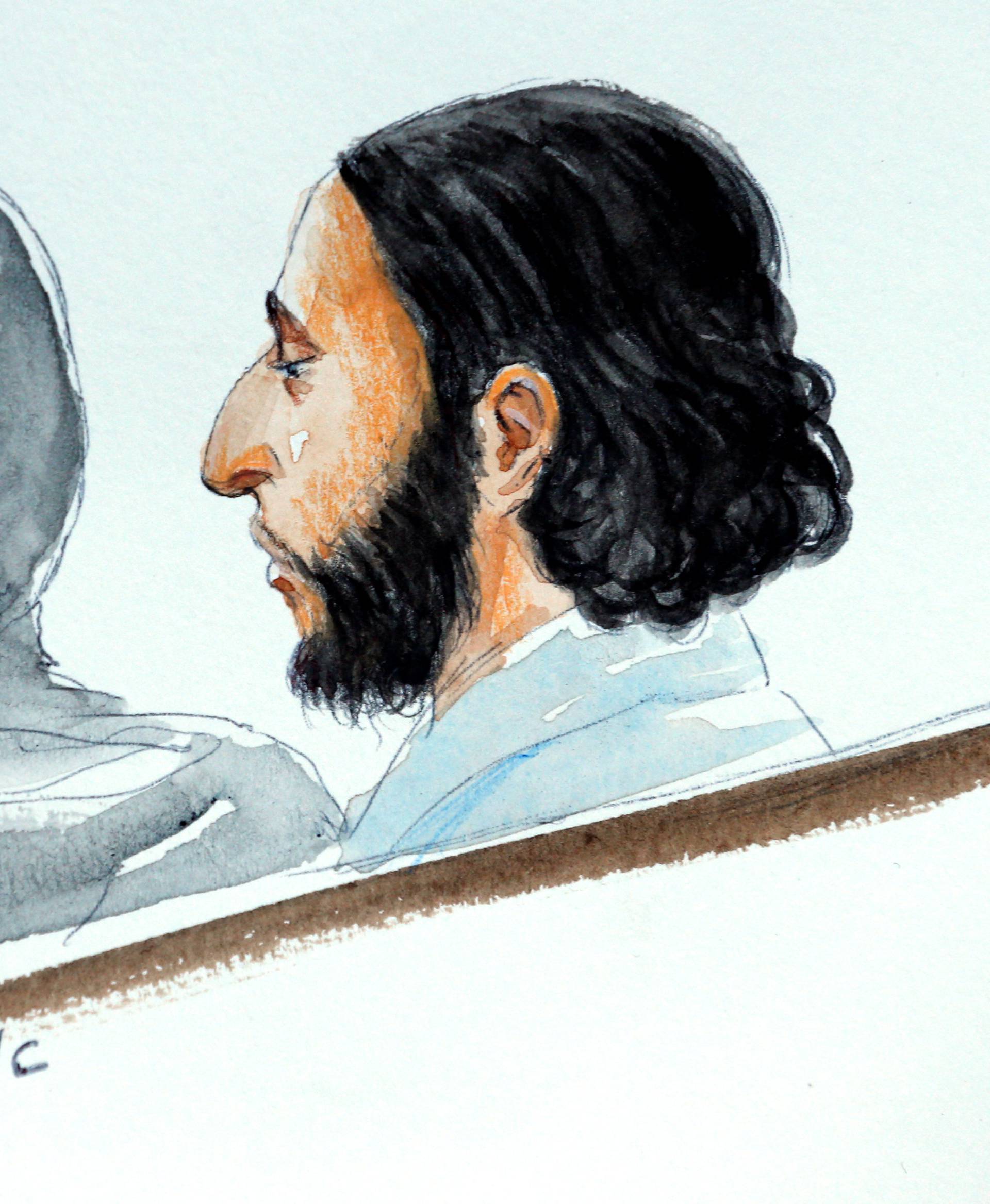 A court artist drawing shows Salah Abdeslam, one of the suspects in the 2015 Islamic State attacks in Paris, in court during his trial in Brussels