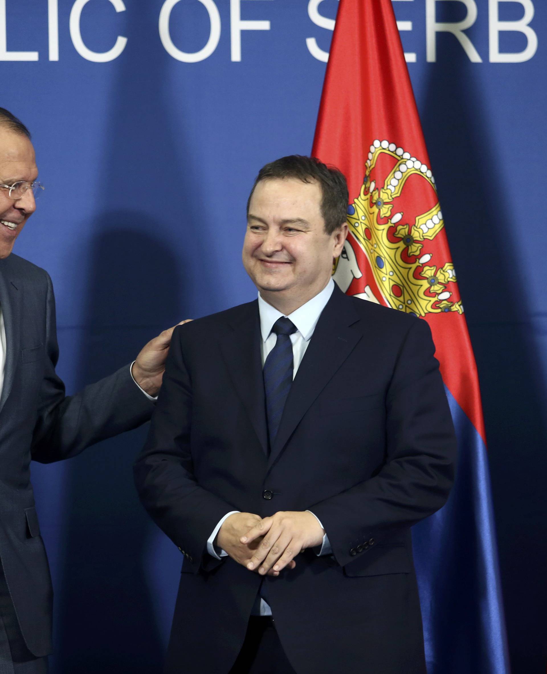 Serbian Foreign Minister Dacic and his Russian counterpart Lavrov arrive for a press conference in Belgrade