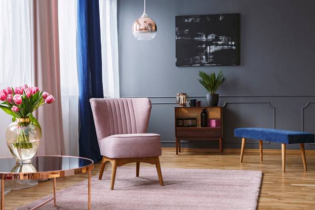 Real,Photo,Of,A,Pink,Armchair,Standing,On,A,Rug