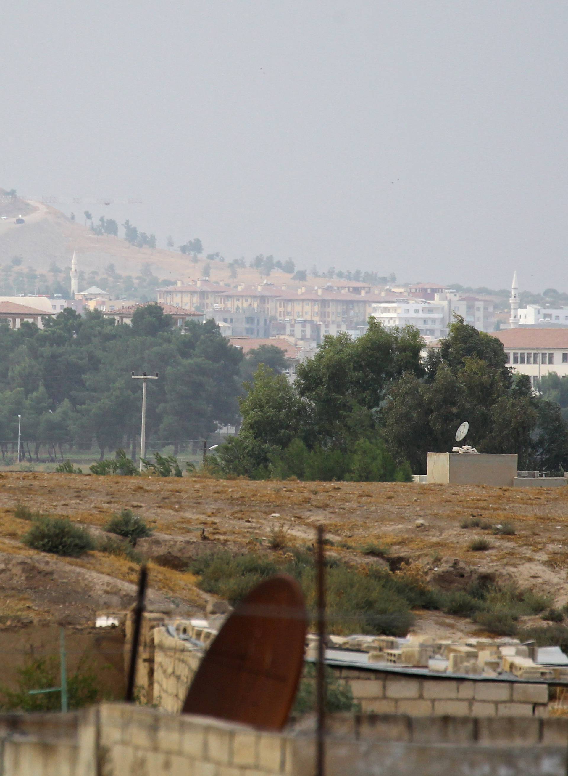 Turkish flag flies as seen from near Ras al Ain Town