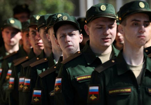 FILE PHOTO: Russian conscripts depart for garrisons from a recruitment centre in Simferopol