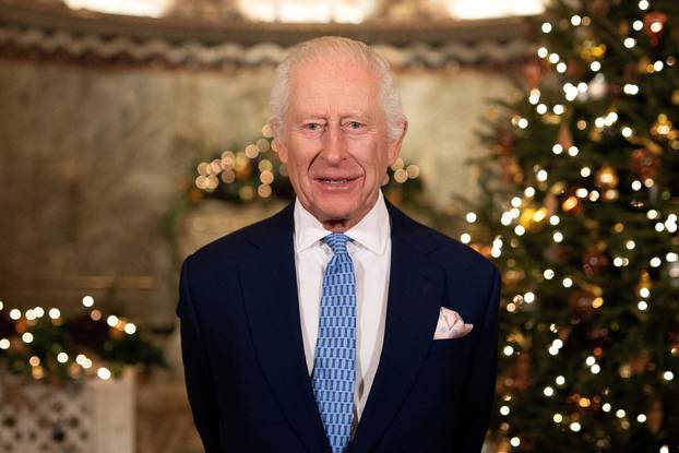 Britain's King Charles attends the recording of his Christmas message at the Fitzrovia Chapel in London