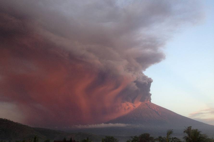 Indonesia's Mount Agung volcano erupts as seen from Amed, Karangasem, Bali