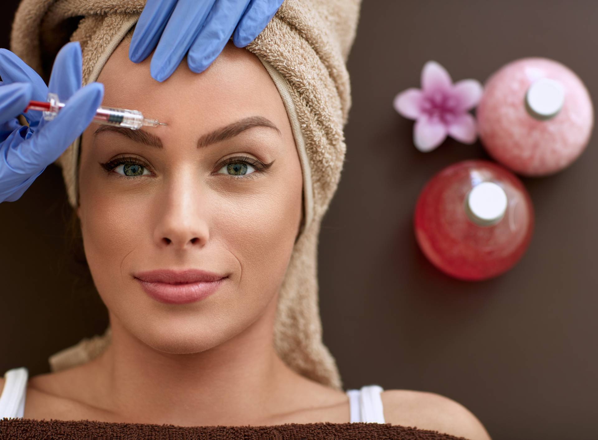 Beautiful woman receiving botox injections