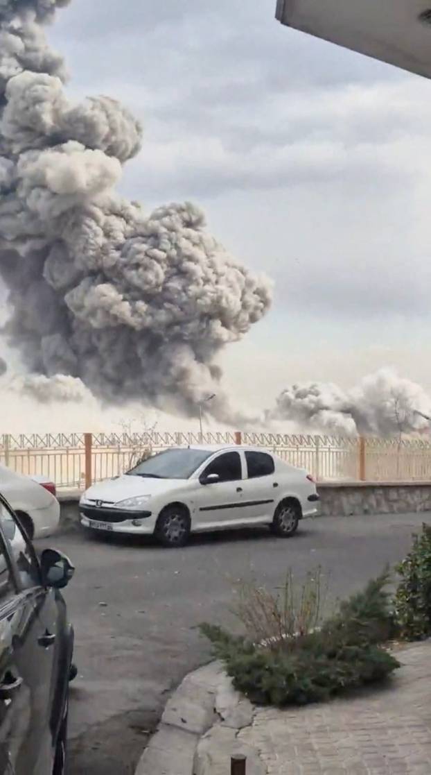 Smoke rises after a strike on a building which the U.S. Central Command reported as a strike on the Islamic Revolutionary Guard Corps (IRGC) headquarters in Tehran