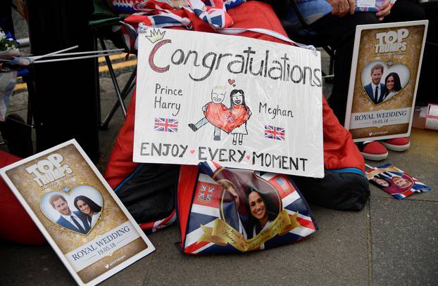 Goodwill messages are seen beside royal fans outside of  Windsor Castle, the location for the forthcoming wedding of Britain
