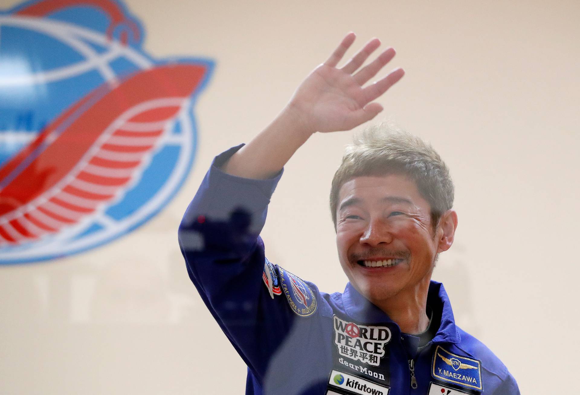 Space flight participant Yusaku Maezawa attends a news conference in Baikonur