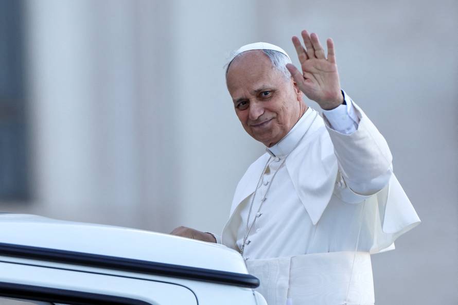 Pope Leo XIV greets the faithful ahead of a Holy Mass presided over by Metropolitan Archbishop of Zagreb Drazen Kutlesa, at the Vatican