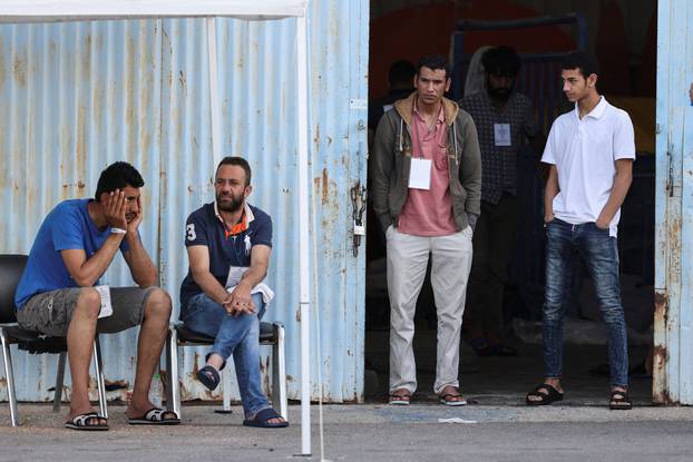 Rescued migrants at the port of Kalamata following a rescue operation