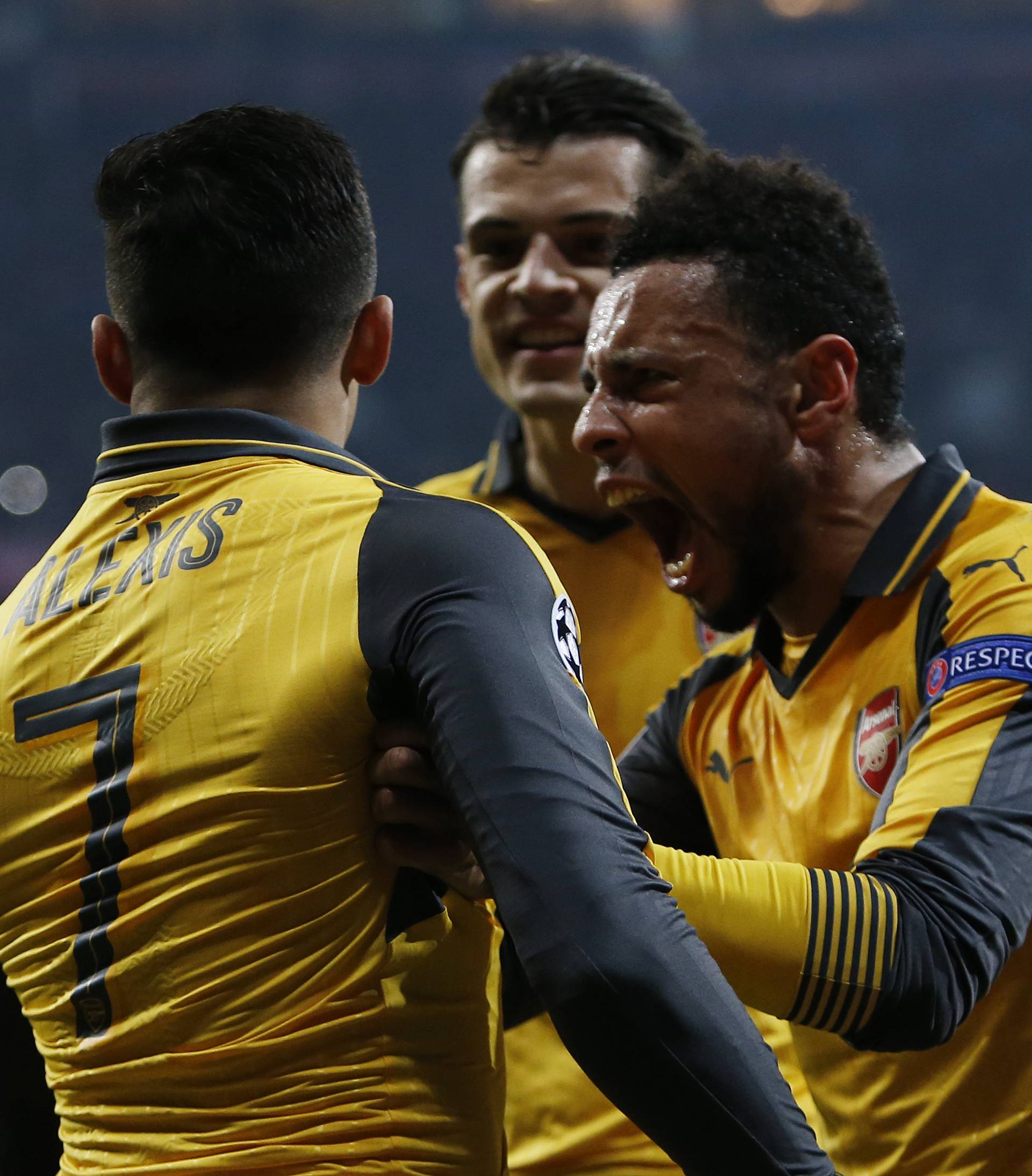 Arsenal's Alexis Sanchez celebrates scoring their first goal with Francis Coquelin and Granit Xhaka