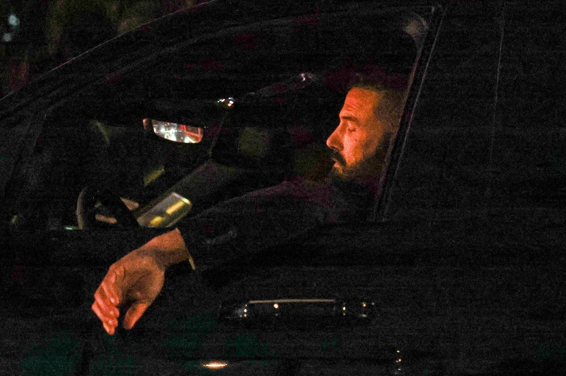 *EXCLUSIVE* Ben Affleck looks shocked while driving home from his office to see the huge fire burning across the street from where he lives in LA!